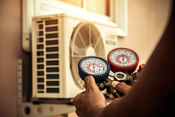 Professional Air Conditioning Service technician working in Newport, PA